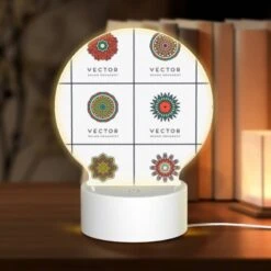 Round Acrylic Night Light, A Collection Of Different Colored Geometric Shapes.