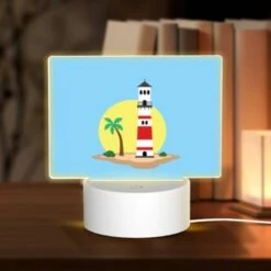 Rectangular Acrylic Night Light, A Lighthouse Is On A Small Island With A Sunset In The Background.