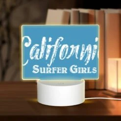 Rectangular Acrylic Night Light, A Blue Sign That Says "California Surfer Girls.".