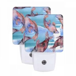 Night Light Set Of 2, A Group Of Fish Swimming In The Water.