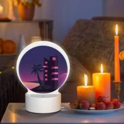 Round Acrylic Night Light, A Tall Building With A Pink And Black Color Scheme Is Lit Up At Night. -Pattern Diy Shop 358919407ccdb1e759a69ed846370e1b65cb6ade