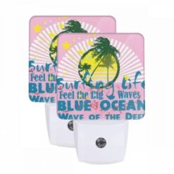 Night Light Set Of 2, A Pink And Blue Surfing Poster With A Big Wave.