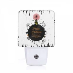 Night Light, A Black And White Poster With A Witch On A Broomstick And The Words "Happy Halloween" Written In Orange.