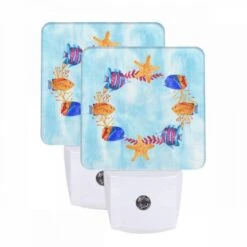 Night Light Set Of 2, A Colorful Painting Of Fish And A Starfish.
