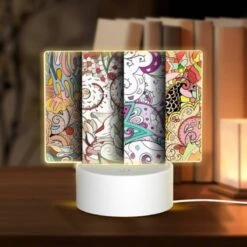 Rectangular Acrylic Night Light, Four Different Colored Paintings Of Swirls And Designs.