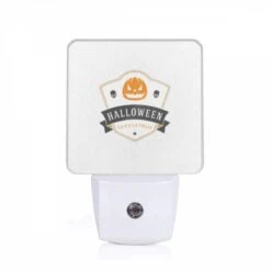 Night Light, A Halloween Logo With A Skull And A Pumpkin.