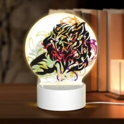 Round Acrylic Night Light, A Colorful And Abstract Design Of A Face.