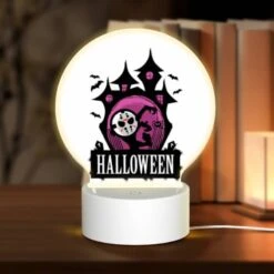 Round Acrylic Night Light, A Halloween Poster With A Pink Background And A Haunted House.