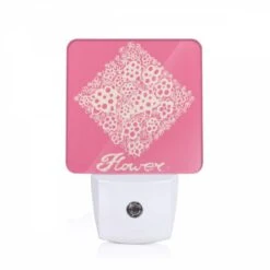 Night Light, A Pink Square With White Flowers On It.