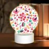 Round Acrylic Night Light, A Colorful Bird With A Flower In Its Mouth.