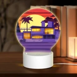Round Acrylic Night Light, A House With A Purple Roof And A Sunset In The Background.