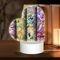 Love Acrylic Night Light, Three Colorful And Intricate Designs Are Displayed On A Row Of Paper.
