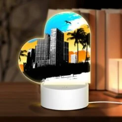 Love Acrylic Night Light, A Black And White Drawing Of A City With A Bird Flying Above It.