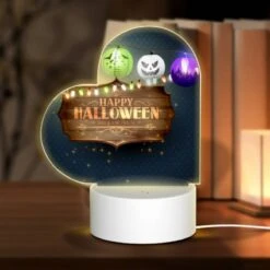 Love Acrylic Night Light, A Sign That Says Happy Halloween Trick Or Treat.
