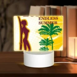 Rectangular Acrylic Night Light, A Woman Is Holding A Surfboard In Front Of A Tropical Beach.