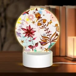 Round Acrylic Night Light, A Colorful Flower Arrangement With A Butterfly And A Bee.