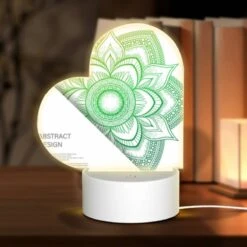 Love Acrylic Night Light, A Green And Yellow Flower Design.