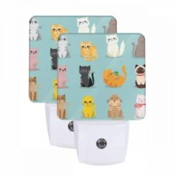 Night Light Set Of 2, A Collection Of Cats In Various Colors And Poses.